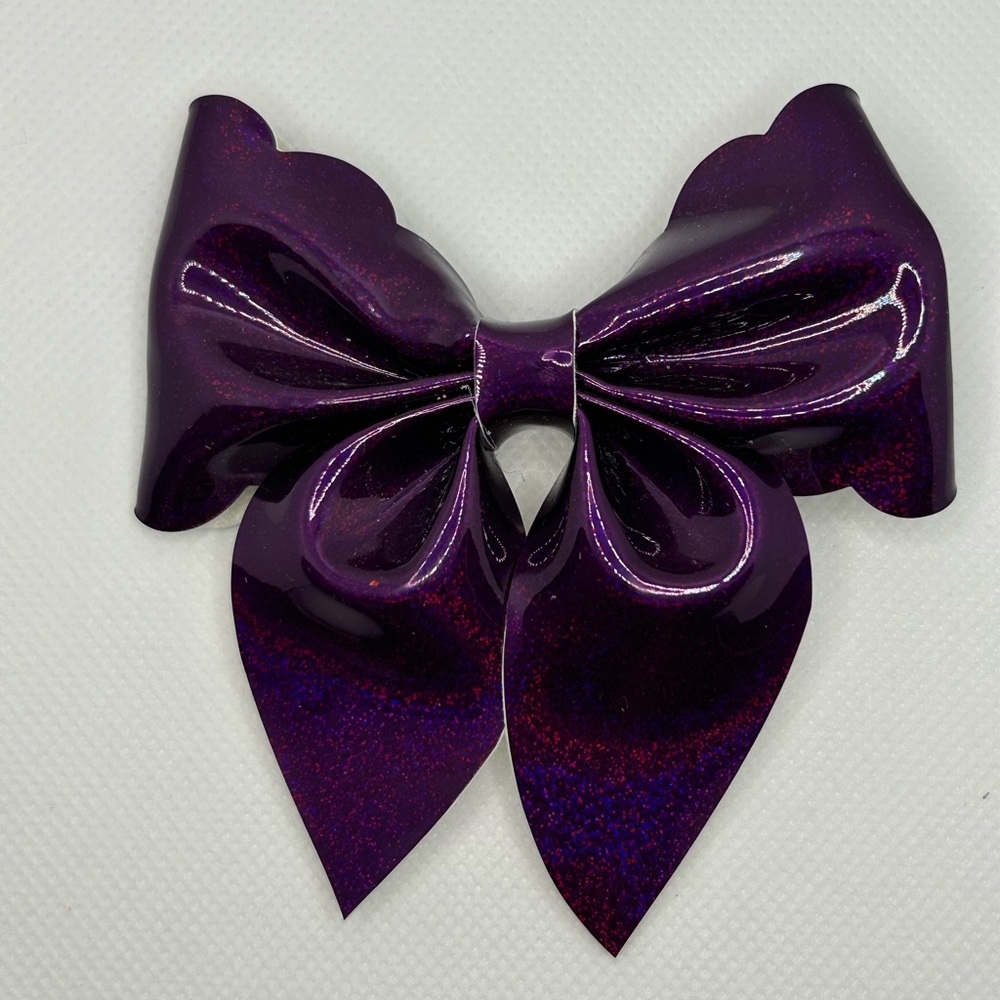 Handmade plum leather bow